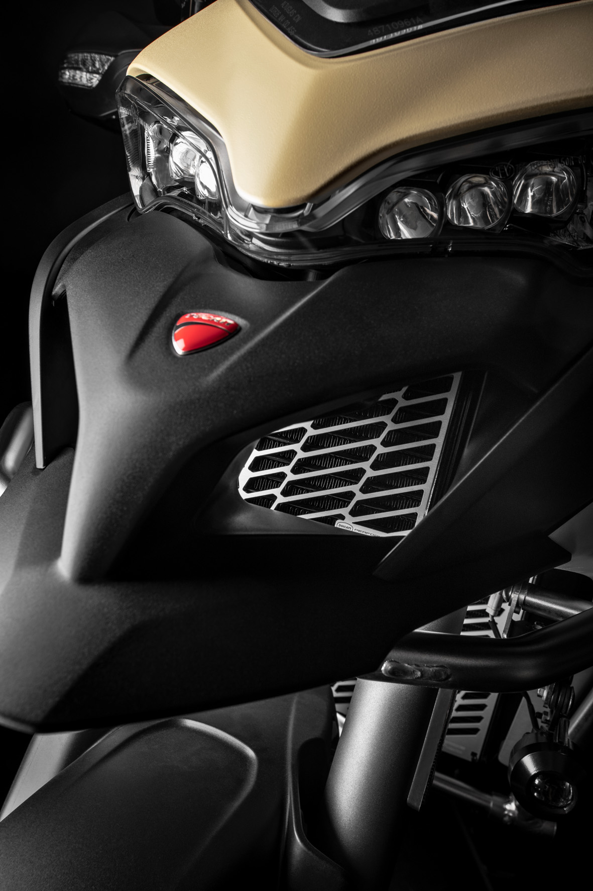 Protective mesh for oil cooler.